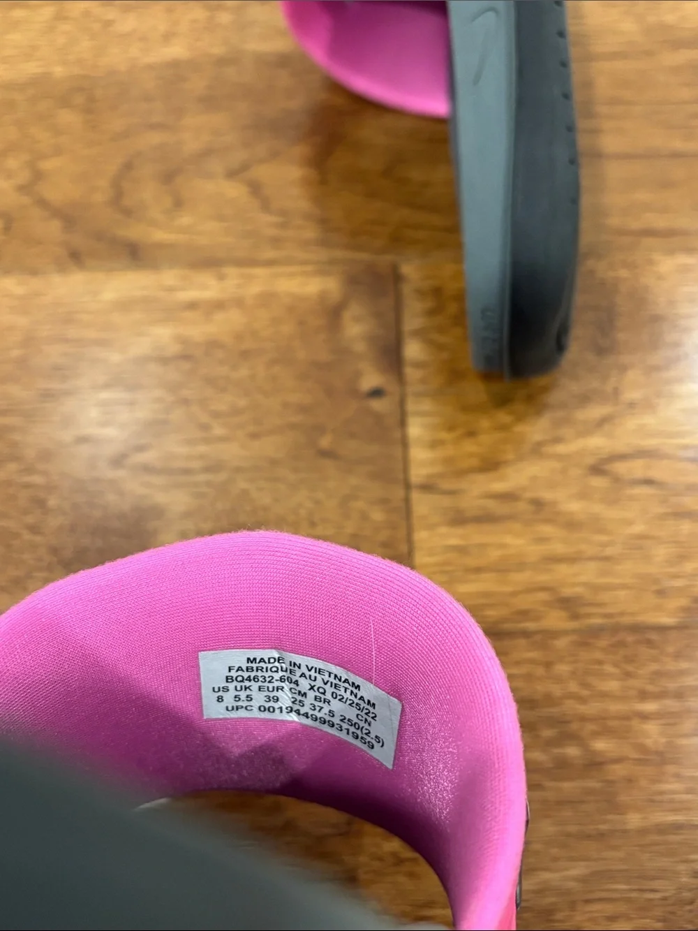 Nike Women’s Pink and Gray Slide Sandals with Bold Logo